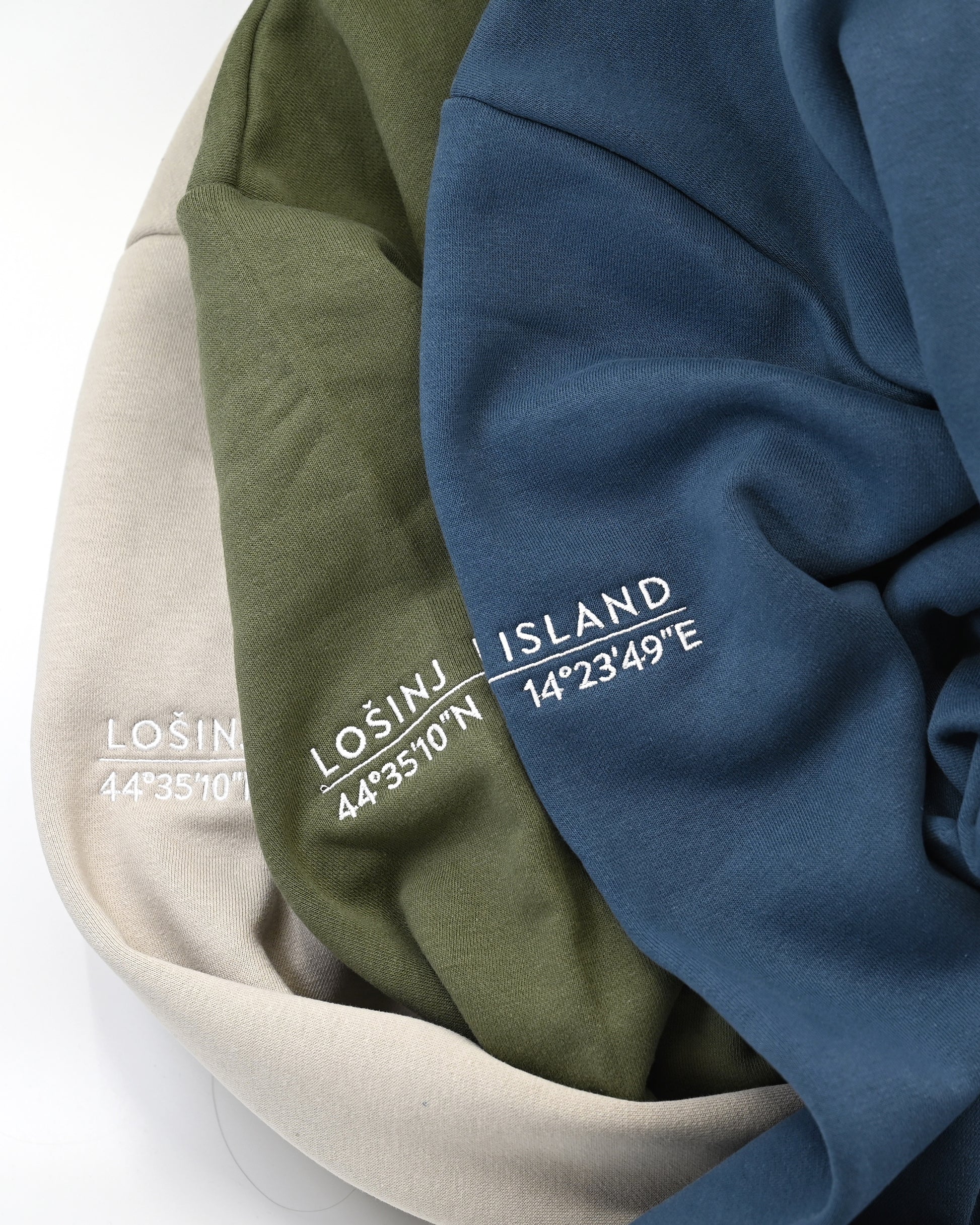 Premium, heavy hoodies with Lošinj island coordinates stitched on the sleeve.