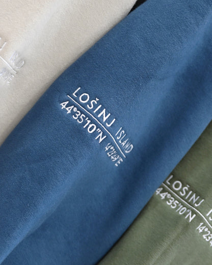 Premium, heavy hoodie  with Lošinj island coordinates stitched on the sleeve.