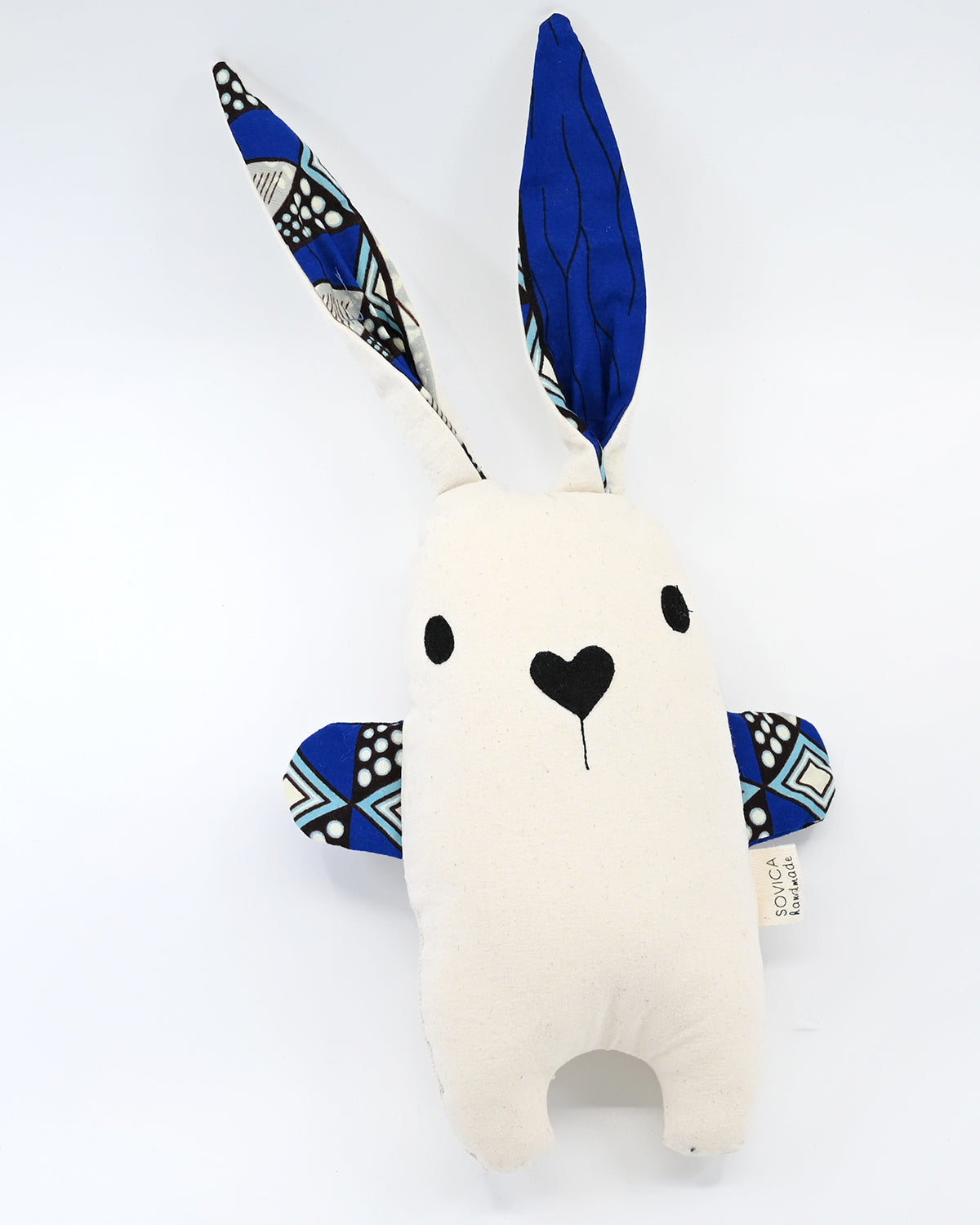 Soft rabbit toy by Croatian designer Sovica, made from cotton nautical stripes or African wax fabric and suitable for babies and children.